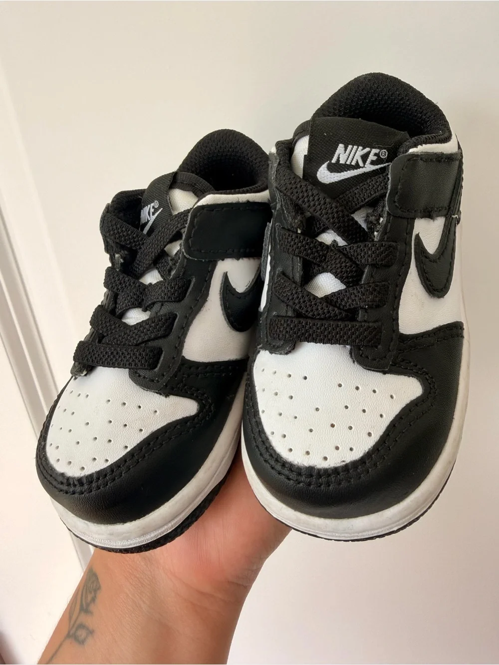 Nike Kids Black and White Low-Top Sneaker with Swoosh